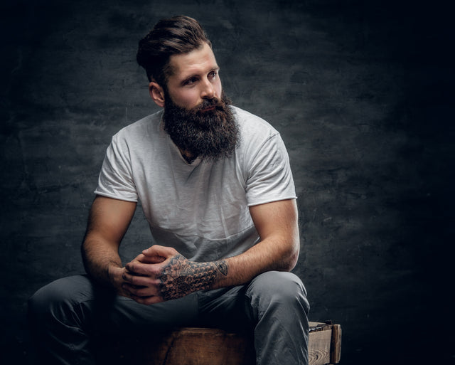Beardsman in T-Shirt Casually Sitting - Lucky Boy Beard Company